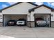 Three-car garage with ample space for vehicles and storage at 23527 W Estes Way, Buckeye, AZ 85326