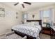 Spacious bedroom with large bed, nightstands, and dresser at 23802 W Tamarisk Ave, Buckeye, AZ 85326