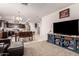 Kitchen with dark cabinets, granite counters, and a breakfast bar at 23802 W Tamarisk Ave, Buckeye, AZ 85326