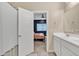 Bathroom with double vanity and view of bedroom at 2562 N Abbey Rd, Casa Grande, AZ 85122