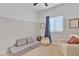 Cozy bedroom with seating area and window at 2562 N Abbey Rd, Casa Grande, AZ 85122