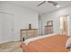 Bedroom with dresser and orange bedding at 2562 N Abbey Rd, Casa Grande, AZ 85122