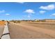 View of a community path and neighboring homes at 2562 N Abbey Rd, Casa Grande, AZ 85122