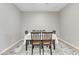 Simple dining room with square table and six chairs at 2562 N Abbey Rd, Casa Grande, AZ 85122