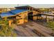 Community clubhouse with wood siding and metal roof at 26096 S 228Th Pl, Queen Creek, AZ 85142