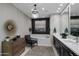 Elegant bathroom featuring a soaking tub, double vanity, and modern chandelier at 26698 N 104Th Way, Scottsdale, AZ 85262