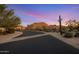 Landscaped street with mountain views and desert plants at 26698 N 104Th Way, Scottsdale, AZ 85262