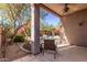 Relaxing backyard patio with seating area and a view of the pool at 26818 N 66Th Ln, Phoenix, AZ 85083