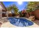 Stunning kidney shaped pool and patio with desert landscaping at 26818 N 66Th Ln, Phoenix, AZ 85083