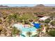 Aerial view of resort-style pool with expansive sundeck and community clubhouse at 29308 N 132Nd Ln, Peoria, AZ 85383