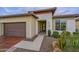 Front entry with walkway, and desert landscaping at 29308 N 132Nd Ln, Peoria, AZ 85383