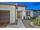 Front entry with walkway, and desert landscaping at 29308 N 132Nd Ln, Peoria, AZ 85383