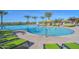 Resort-style pool with plenty of lounge chairs at 29308 N 132Nd Ln, Peoria, AZ 85383