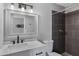 Bathroom with gray tile shower and modern vanity at 2968 E Clarendon Ave, Phoenix, AZ 85016