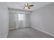 Bright bedroom with ceiling fan and neutral decor at 2968 E Clarendon Ave, Phoenix, AZ 85016