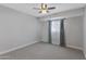 Bedroom with ceiling fan and gray carpeting at 2968 E Clarendon Ave, Phoenix, AZ 85016