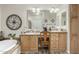 Elegant bathroom with double sinks and soaking tub at 3301 S Goldfield Rd # 5027, Apache Junction, AZ 85119