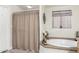 Bathroom with shower and corner bathtub at 3301 S Goldfield Rd # 5027, Apache Junction, AZ 85119