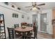 Cozy kitchen nook with round table and French doors at 3301 S Goldfield Rd # 5027, Apache Junction, AZ 85119