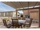 Covered patio with table and chairs at 3301 S Goldfield Rd # 5027, Apache Junction, AZ 85119