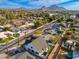 Aerial view of the neighborhood showcasing the house's location with mountain views at 3427 E Campbell Ave, Phoenix, AZ 85018