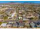 A bird's-eye view showing the house situated in a bustling neighborhood with mountain views at 3427 E Campbell Ave, Phoenix, AZ 85018