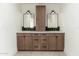 Modern bathroom with double vanity, large mirrors, and green tile at 3427 E Campbell Ave, Phoenix, AZ 85018