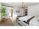 Main bedroom with ensuite bathroom and sliding barn door at 3427 E Campbell Ave, Phoenix, AZ 85018