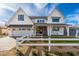 This white farmhouse exterior features a charming front yard with a white picket fence at 3427 E Campbell Ave, Phoenix, AZ 85018