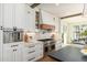 Elegant kitchen with professional range and white cabinetry at 3427 E Campbell Ave, Phoenix, AZ 85018