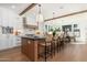 Open concept kitchen featuring an island and hardwood floors at 3427 E Campbell Ave, Phoenix, AZ 85018