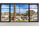 The large window shows a beautiful view of mountains and palm trees at 3427 E Campbell Ave, Phoenix, AZ 85018