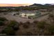 Aerial view showcasing a large home, expansive backyard, and desert landscape at 34709 N 48Th St, Cave Creek, AZ 85331