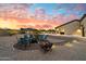 Landscaped backyard featuring firepit and seating area at 34709 N 48Th St, Cave Creek, AZ 85331