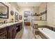 Spa-like bathroom featuring a walk-in shower and a soaking tub at 34709 N 48Th St, Cave Creek, AZ 85331