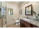 Clean bathroom with a walk-in shower and granite vanity at 34709 N 48Th St, Cave Creek, AZ 85331