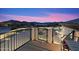 Backyard view from deck at sunset with mountains in the distance at 34709 N 48Th St, Cave Creek, AZ 85331