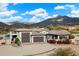 Luxury home exterior with double garage and mountain views at 34709 N 48Th St, Cave Creek, AZ 85331