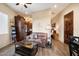 Open living area with a brown leather couch and wooden coffee table at 34709 N 48Th St, Cave Creek, AZ 85331