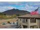 Elevated view of a backyard pool and deck with mountain views at 34709 N 48Th St, Cave Creek, AZ 85331