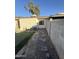 Backyard with artificial turf and gravel areas at 3646 N 69Th Ave # 55, Phoenix, AZ 85033