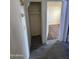 Clean hallway with wood-look flooring and a closet at 3646 N 69Th Ave # 55, Phoenix, AZ 85033