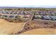 Aerial view of neighborhood with homes and park at 37029 N Andravida Dr, San Tan Valley, AZ 85140