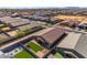 Aerial view of house, yard, and surrounding homes at 37029 N Andravida Dr, San Tan Valley, AZ 85140