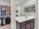 Bathroom with vanity, sink, and large closet at 37029 N Andravida Dr, San Tan Valley, AZ 85140