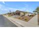 House exterior showcasing a side view and paved walkway at 37029 N Andravida Dr, San Tan Valley, AZ 85140