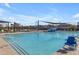 Community swimming pool with accessible lift at 37029 N Andravida Dr, San Tan Valley, AZ 85140