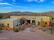 Single-story home with landscaped yard and mountain views at 38844 N Spur Cross Rd, Cave Creek, AZ 85331