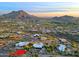 Broad aerial showcasing the property's location in a scenic desert community at 38844 N Spur Cross Rd, Cave Creek, AZ 85331