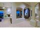 Grand entryway with high ceilings and arched doorways at 38844 N Spur Cross Rd, Cave Creek, AZ 85331